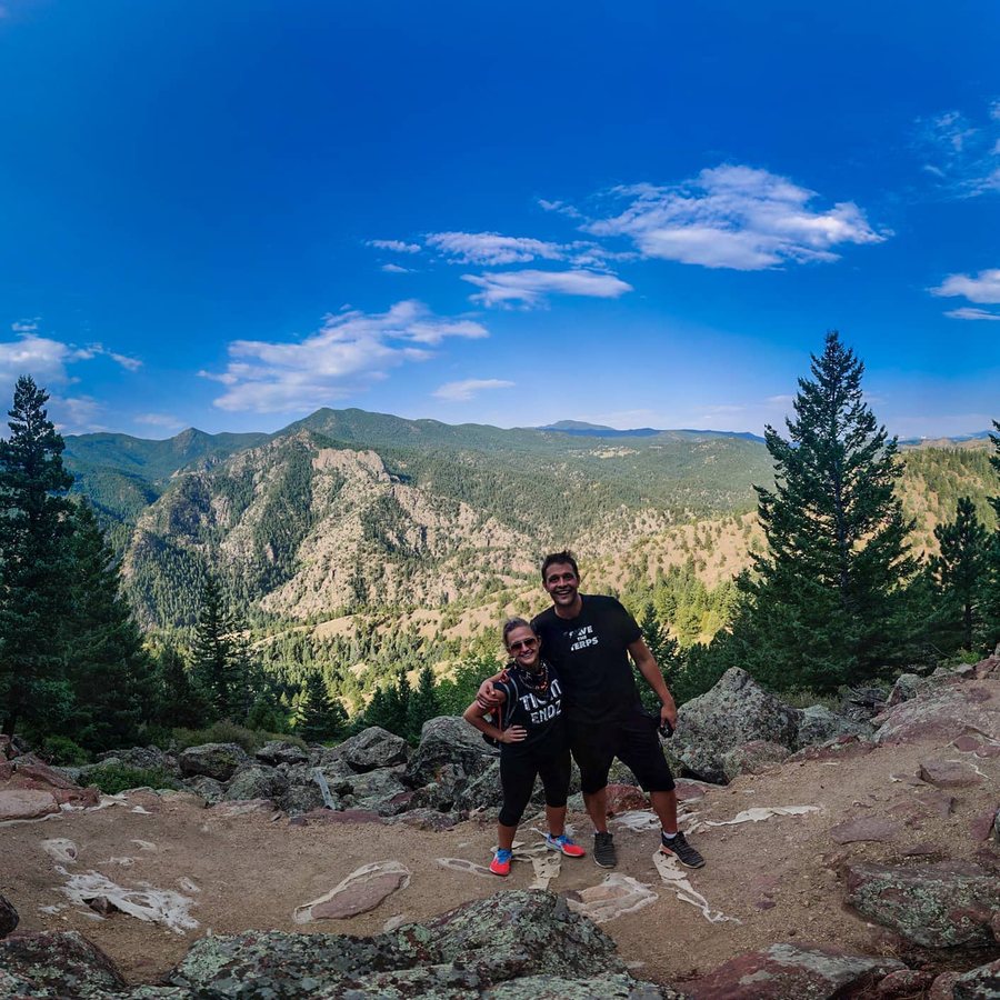 Jake and Sam on a rocky overlook above a forested Front Range canyon